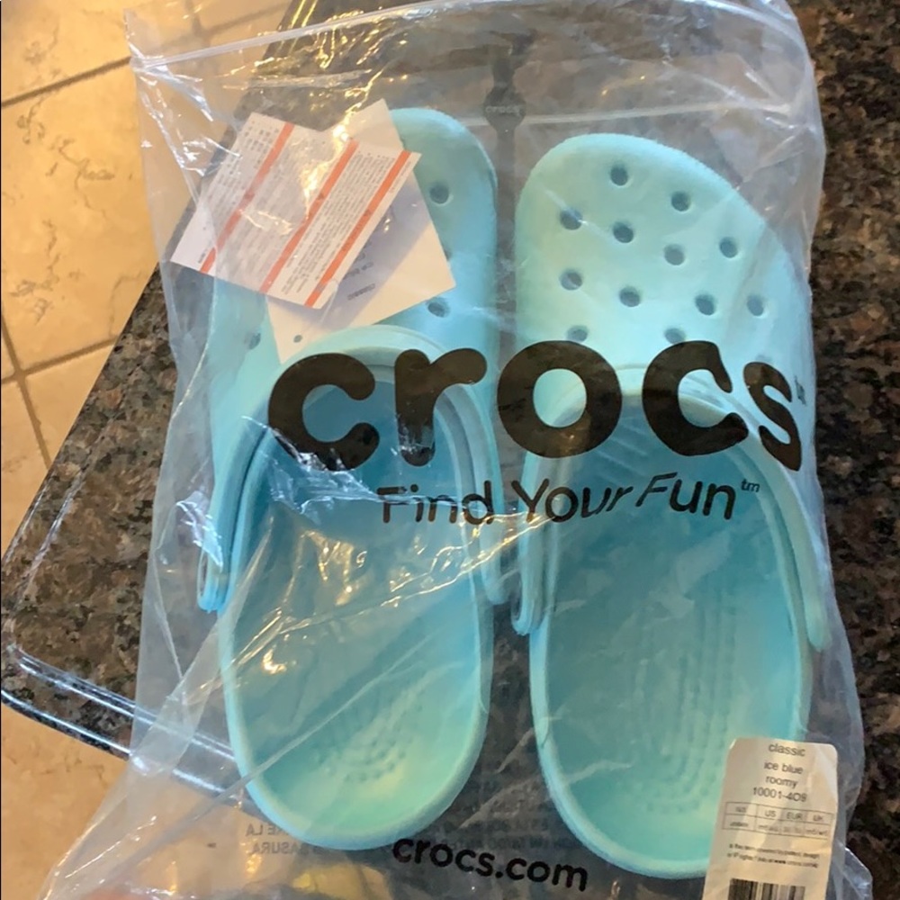 Teal crocs